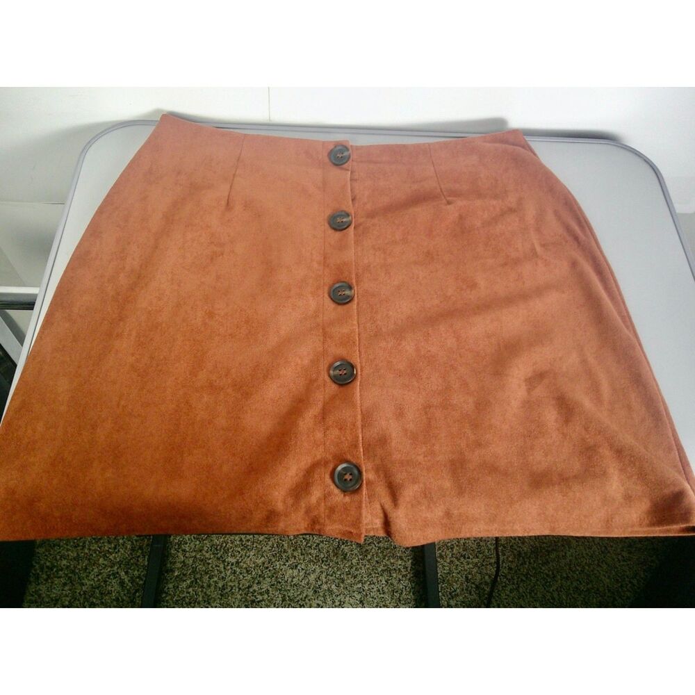 WOMEN RUST KNEE LENGTH SKIRT. SIZE L